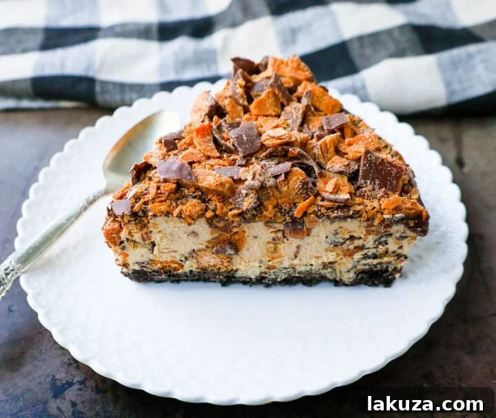 Decadent Butterfinger Pie 2 No-Bake Chocolate Peanut Butter Butterfinger Pie with a chocolate OREO crust, creamy peanut butter filling with Butterfinger candy bars, chocolate ganache, and topped with fresh whipped cream and Butterfinger. The best creamy Butterfinger pie recipe!