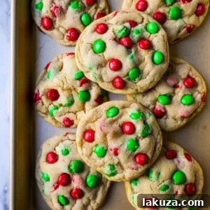 Soft, chewy M&M Cookies are the perfect Christmas cookie. This is the best M & M cookie recipe!