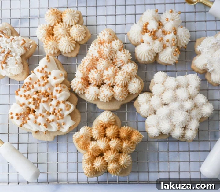 Soft, chewy homemade Christmas Sugar cookies with buttercream frosting. This is the best cut out sugar cookie recipe!