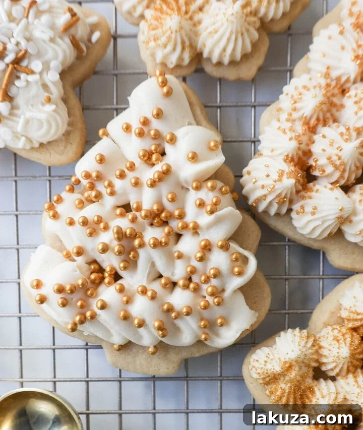Soft, chewy homemade Christmas Sugar cookies with buttercream frosting. This is the best cut out sugar cookie recipe!