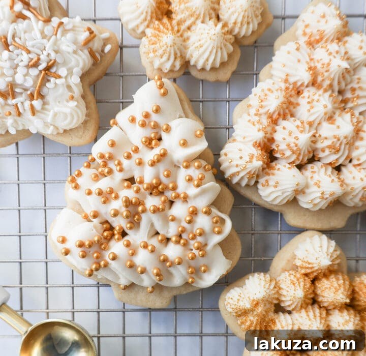Soft, chewy homemade Christmas Sugar cookies with buttercream frosting. This is the best cut out sugar cookie recipe!