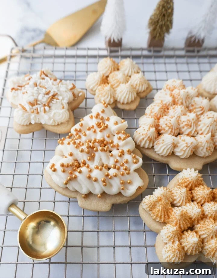 Soft, chewy homemade Christmas Sugar cookies with buttercream frosting. This is the best cut out sugar cookie recipe!