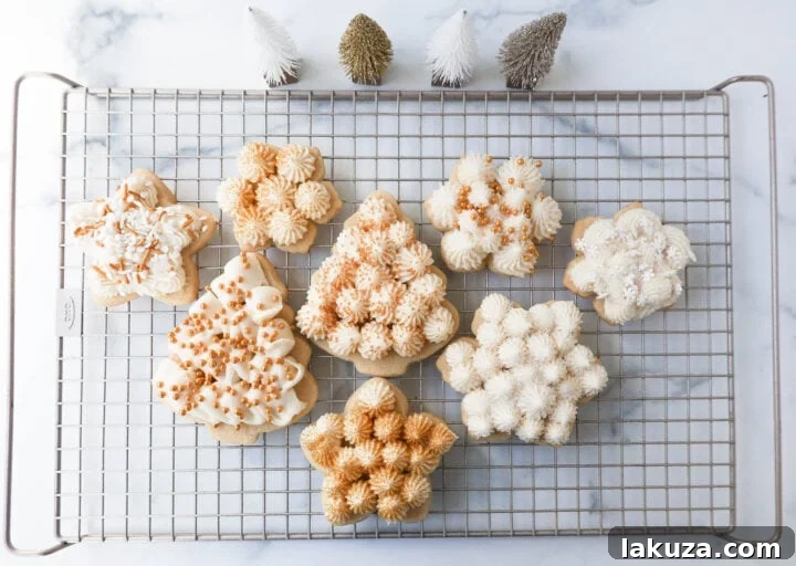 Soft, chewy homemade Christmas Sugar cookies with buttercream frosting. This is the best cut out sugar cookie recipe!