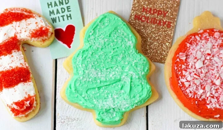 Soft, chewy homemade Christmas Sugar cookies with buttercream frosting. This is the best cut out sugar cookie recipe!