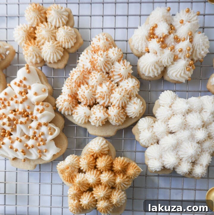 Soft, chewy homemade Christmas Sugar Cookies with buttercream frosting, the best cut-out sugar cookie recipe for the holidays.