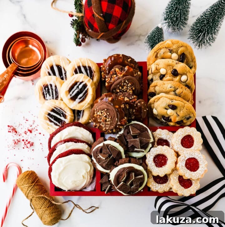 A beautifully arranged Christmas cookie box, overflowing with an assortment of homemade holiday cookies.
