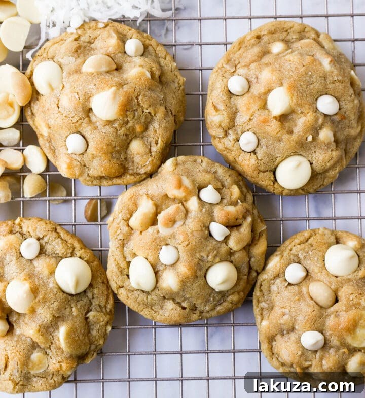 Delicious White Chocolate Coconut Macadamia Nut Cookies with chewy centers and crisp edges.