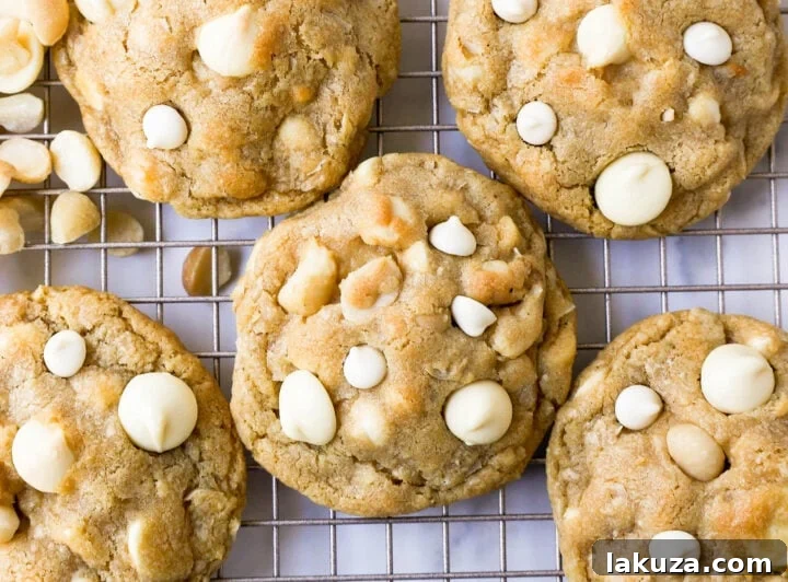 Close-up of a stack of perfect White Chocolate Coconut Macadamia Nut Cookies.