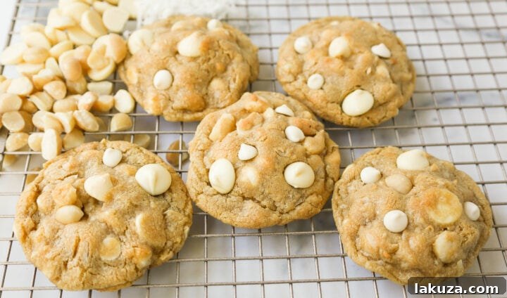 Freshly baked White Chocolate Coconut Macadamia Nut Cookies, perfect for sharing.