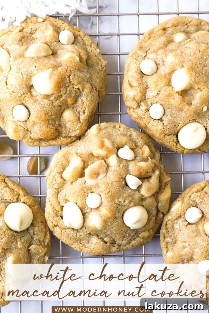 A plate full of golden, chewy White Chocolate Coconut Macadamia Nut Cookies.