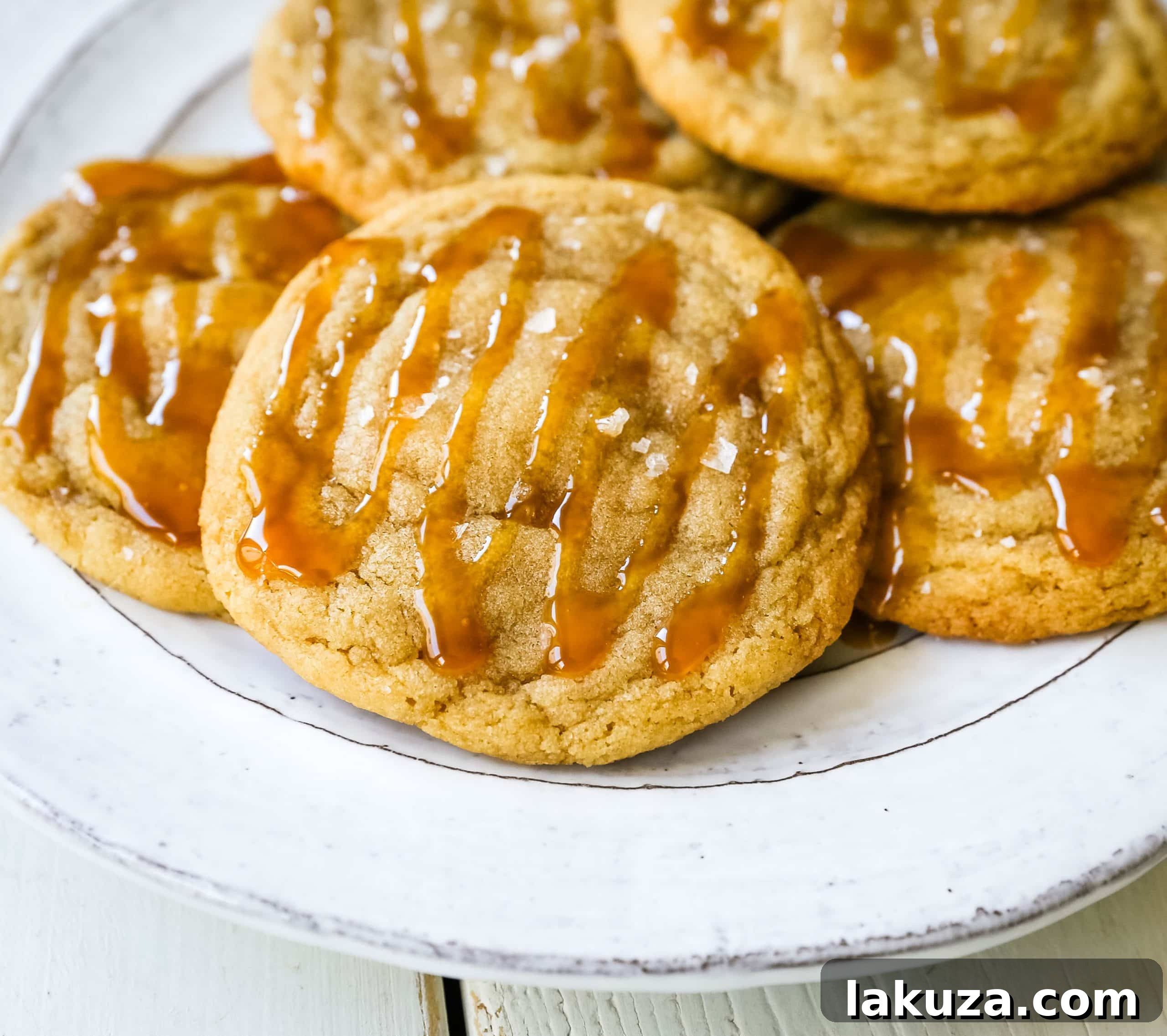 80 Irresistible Christmas Cookie Recipes 17 Salted Caramel Cookies: soft, chewy caramel cookies with sea salt and a decadent salted caramel drizzle.