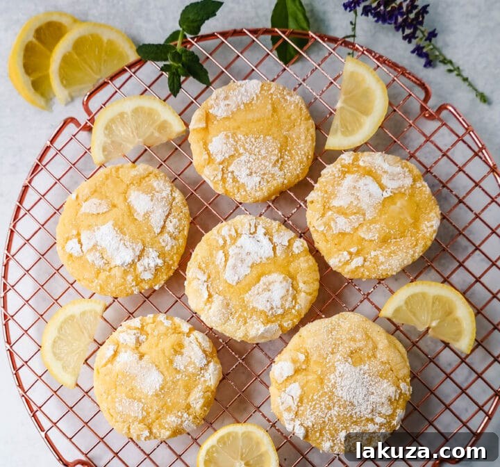 80 Irresistible Christmas Cookie Recipes 27 Lemon Crinkle Cookies: soft, chewy lemon cookies with fresh lemon juice, zest, and extract, rolled in powdered sugar for extra tang!