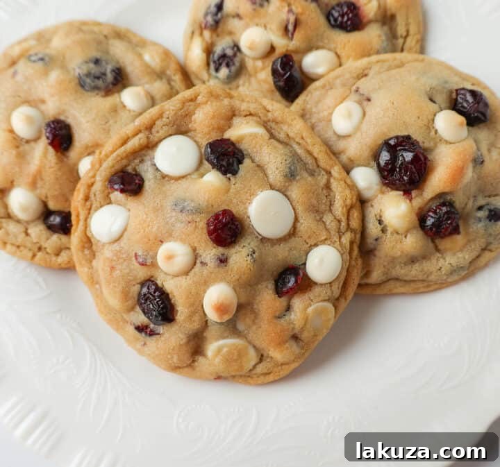 80 Irresistible Christmas Cookie Recipes 31 Soft Cranberry White Chocolate Chip Cookies: perfectly chewy with buttery crispy edges, sweet dried cranberries, and creamy white chocolate chips. The Best White Chocolate Chip Cookie Recipe!