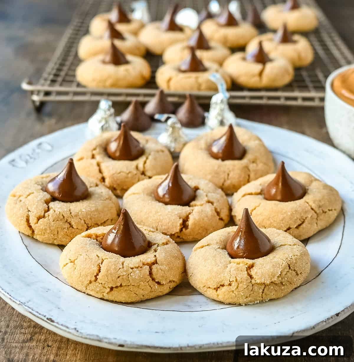 80 Irresistible Christmas Cookie Recipes 5 Easy Peanut Butter Blossoms, a classic Christmas cookie with soft, chewy peanut butter and a Hershey's chocolate kiss. A 60-year-old family recipe!