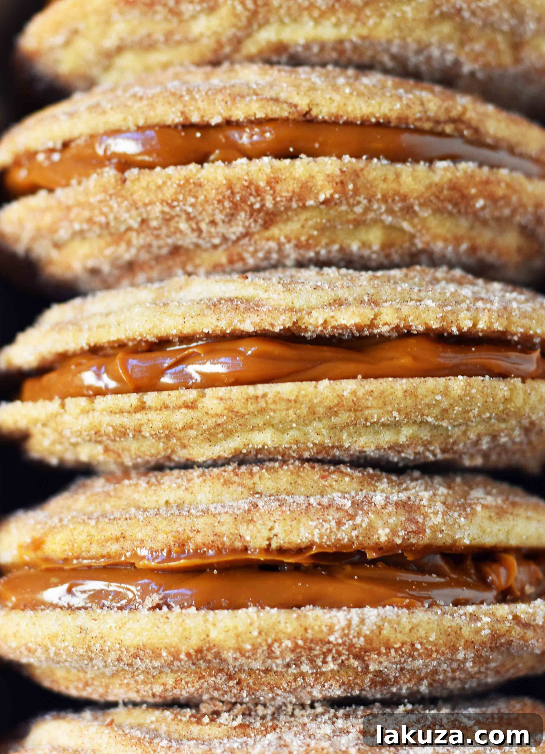 80 Irresistible Christmas Cookie Recipes 57 Dulce de Leche Cinnamon Sandwich Cookies: cinnamon sugar snickerdoodles stuffed with buttery dulce de leche caramel. A sweet and indulgent treat!
