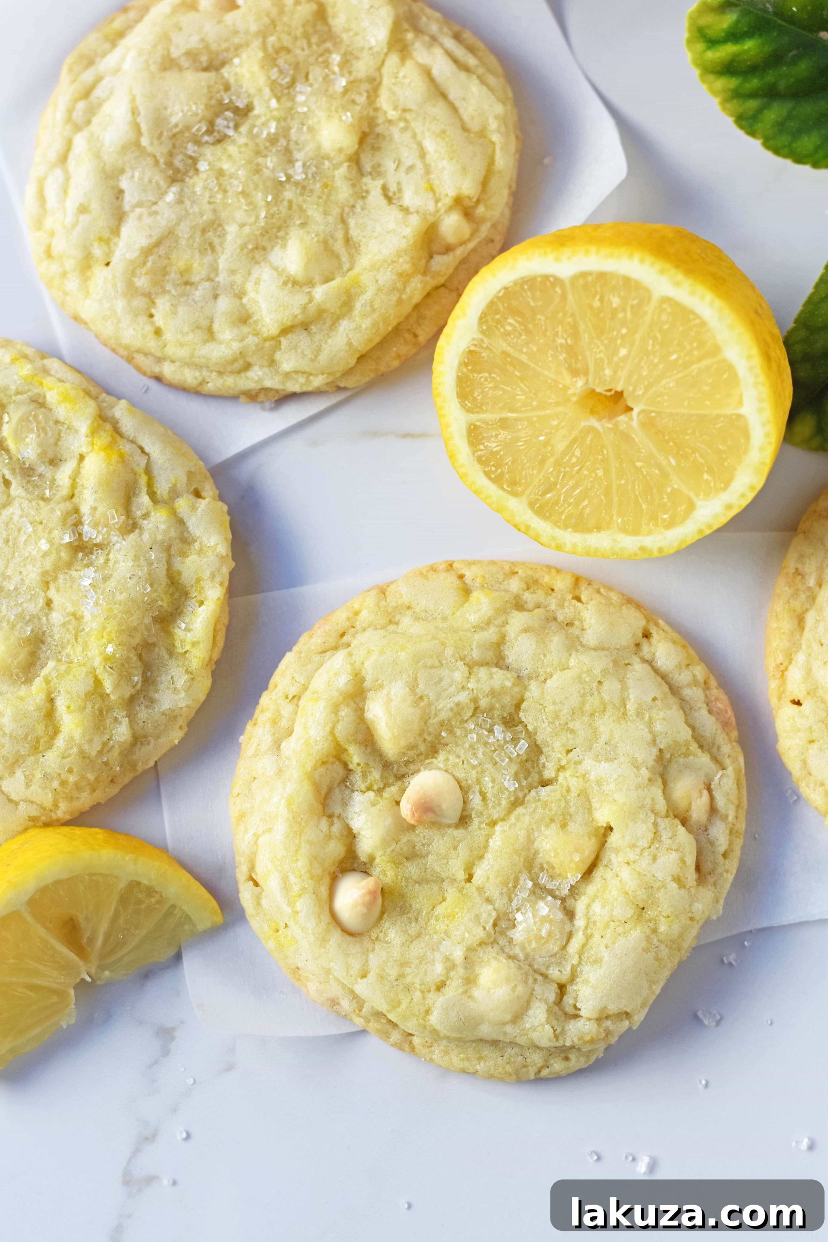 80 Irresistible Christmas Cookie Recipes 88 Lemon White Chocolate Chip Cookies: soft lemon cookies with white chocolate chips. Deliciously bright and sweet!