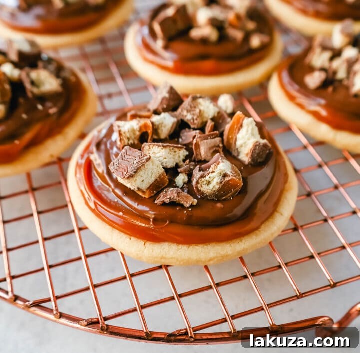 80 Irresistible Christmas Cookie Recipes 10 Twix Cookies with soft sugar shortbread, rich caramel, milk chocolate, and chopped Twix candy bars. The best chocolate caramel shortbread cookie!