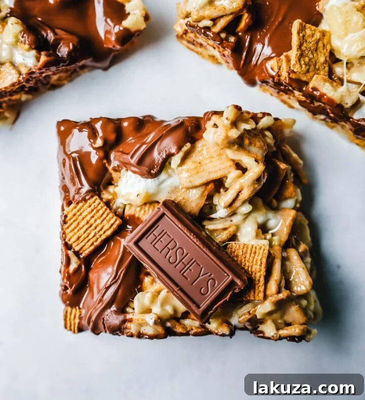 80 Irresistible Christmas Cookie Recipes 95 S'mores Chocolate Marshmallow Rice Krispies Treats Bars: buttery Rice Krispies treats with Golden Grahams, chocolate, and marshmallows, made in under 15 minutes!