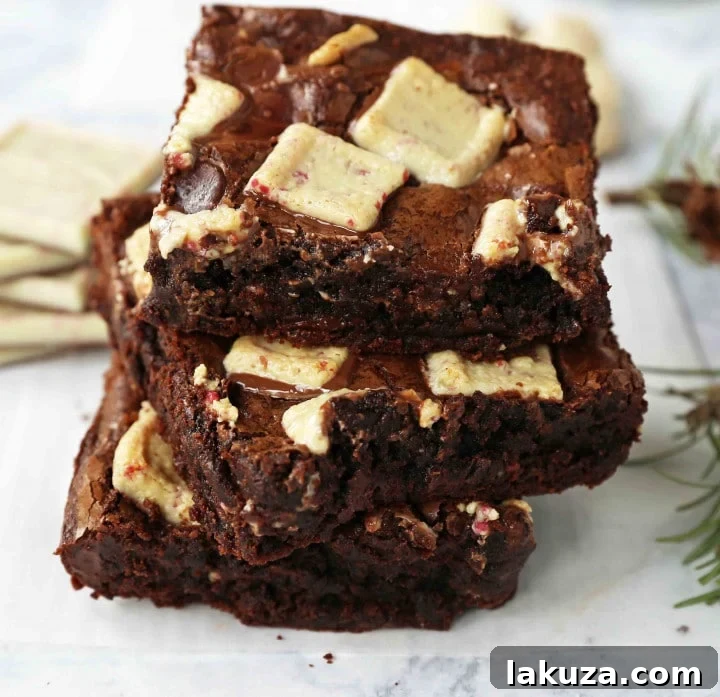 80 Irresistible Christmas Cookie Recipes 98 Peppermint Bark Brownies: decadent homemade chocolate brownies with white chocolate peppermint bark. The perfect Christmas holiday brownie!