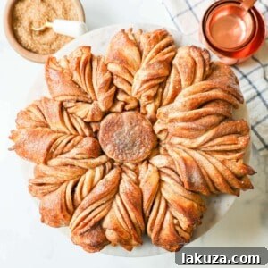 This Star Bread is a pull-apart bread that is perfectly soft and fluffy and filled with your favorite fillings. This is a Cinnamon Sugar Star Bread with layers of butter, cinnamon, and sugar, and shaped into a beautiful star.
