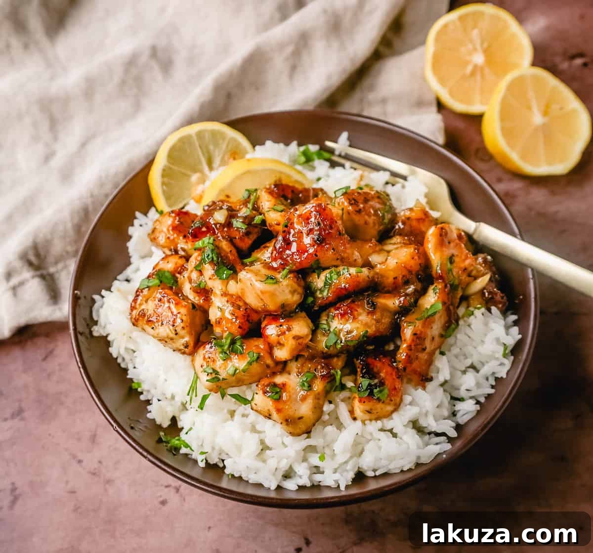 A top-down view of Honey Lemon Chicken served with a side of rice, showcasing its inviting glaze.