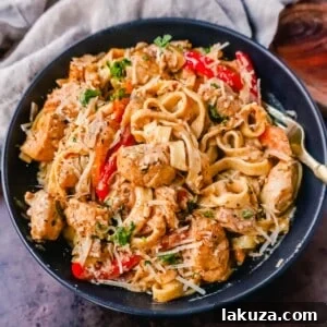 Creamy Cajun Chicken Pasta with tender chicken, rich sauce, and seasonings.