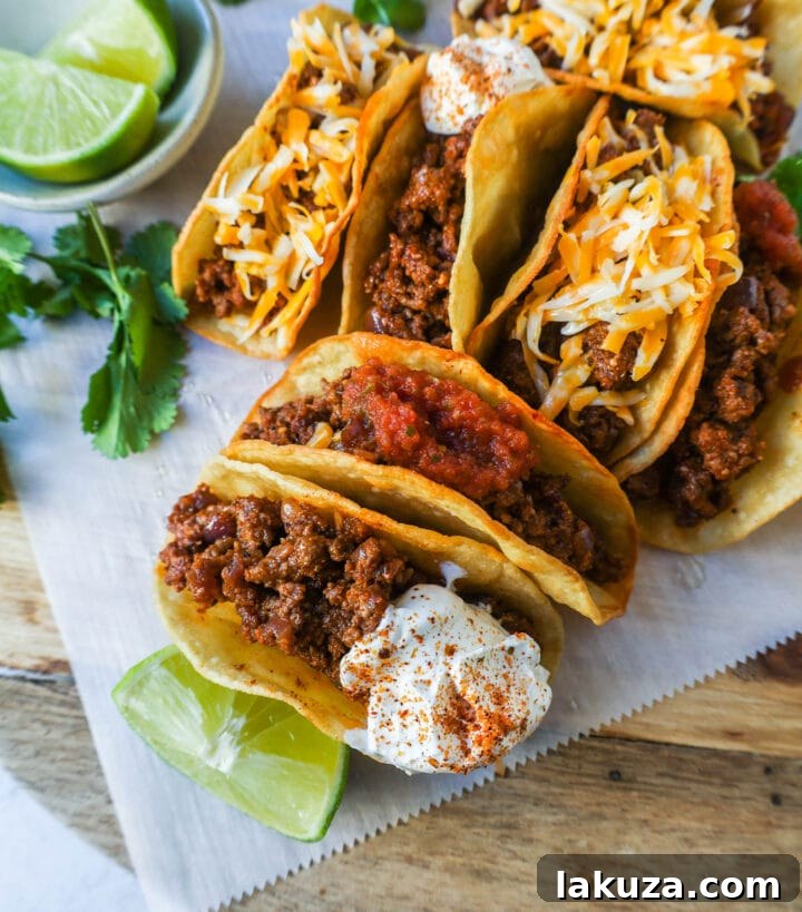 Savory Ground Beef Tacos 3 Close-up of freshly made Ground Beef Tacos with various toppings.