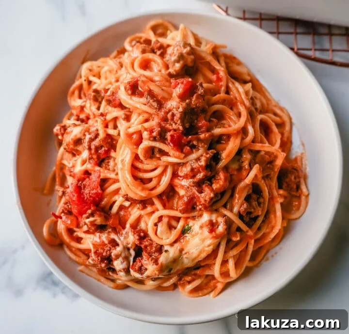 TikTok's Million-Dollar Baked Spaghetti Sensation 2 Classic TikTok Million Dollar Spaghetti bake with gooey cheese