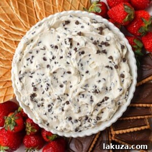 Cannoli Cream Delight 7 This is the Best Cannoli Dip Recipe made with ricotta cheese, mascarpone or cream cheese, powdered sugar, brown sugar, vanilla, and mini chocolate chips.