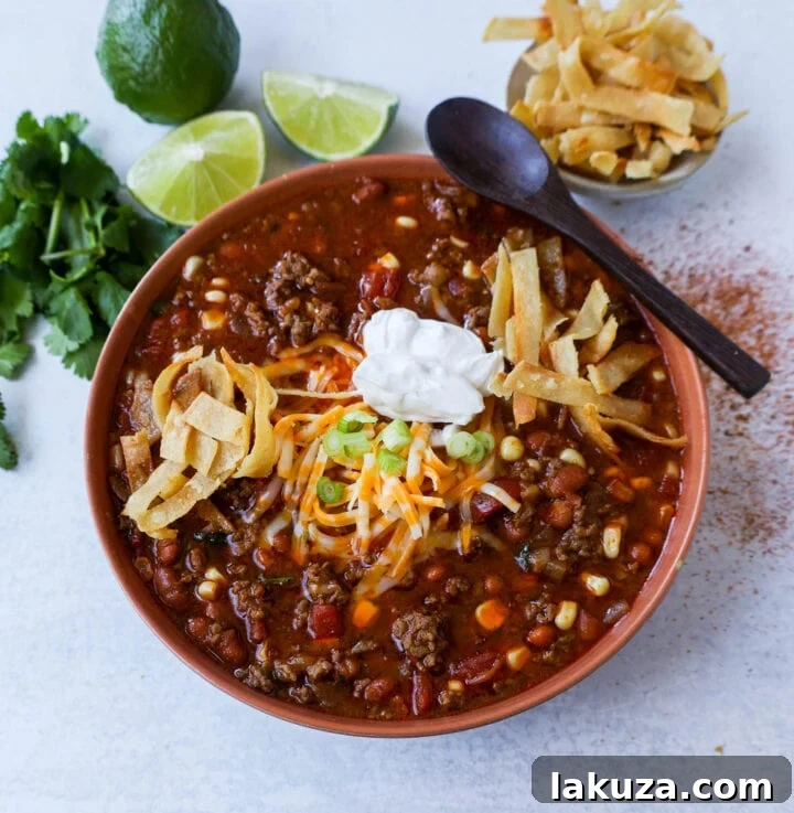 A bowl of delicious Taco Soup with toppings