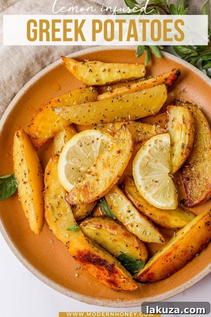 These Greek Roasted Potatoes are infused with extra-virgin olive oil, lemon juice, garlic, oregano, spices, and chicken broth which makes the creamiest roasted potatoes full of Greek flavor.