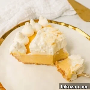 Tropical Passion Tart 7 A delightful passion fruit pie with fresh whipped cream and garnishes.