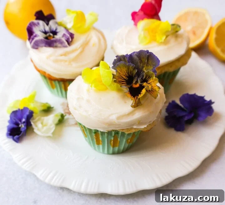 Bright Lemon Cupcake Bliss 2 Irresistibly light and fluffy homemade lemon cupcakes topped with a bright, fresh lemon cream cheese frosting, perfect for spring and summer desserts.