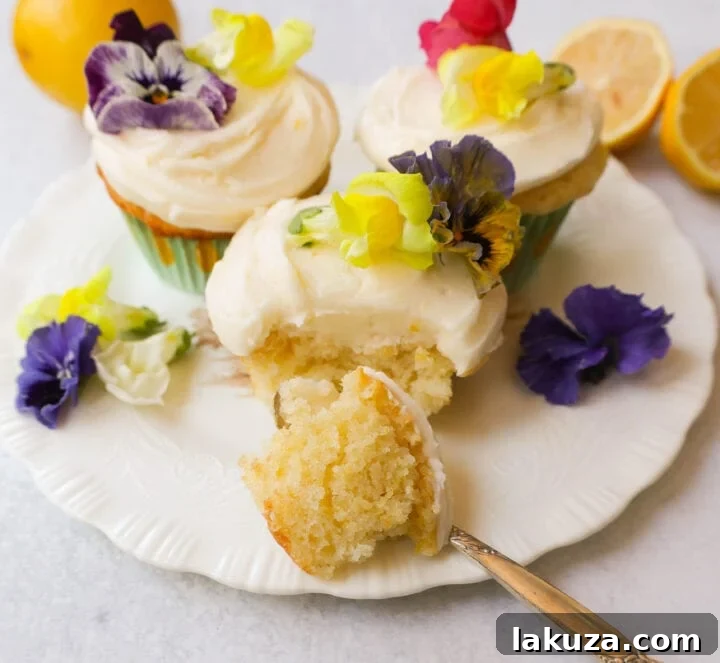 Bright Lemon Cupcake Bliss 5 Freshly baked lemon cupcakes with creamy lemon frosting arranged on a cooling rack, glistening with sparkling sugar.