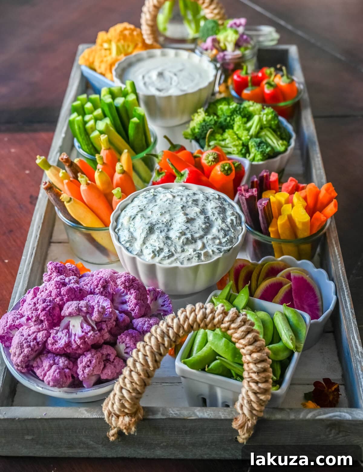 Crudite platter also known as a vegetable board, veggie tray, vegetable platter with dips.