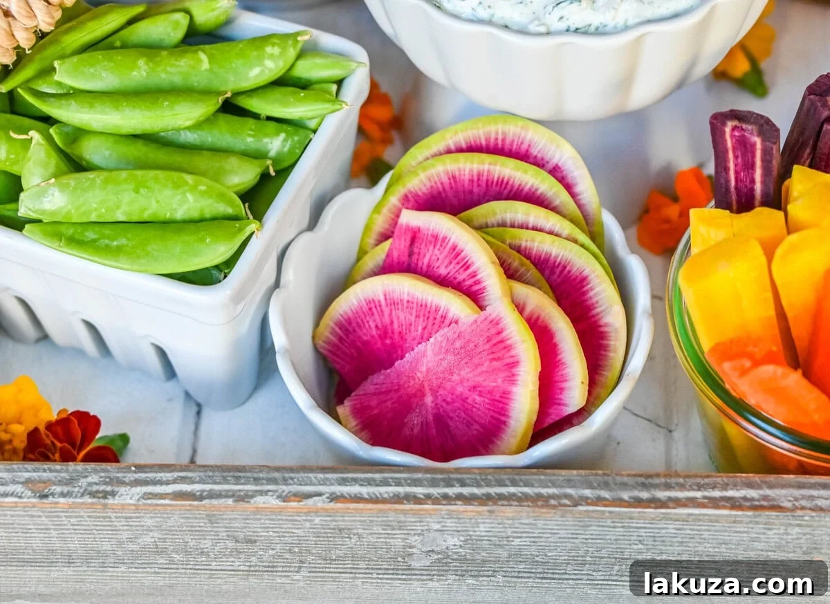 Rainbow radishes on crudite platter or veggie board.