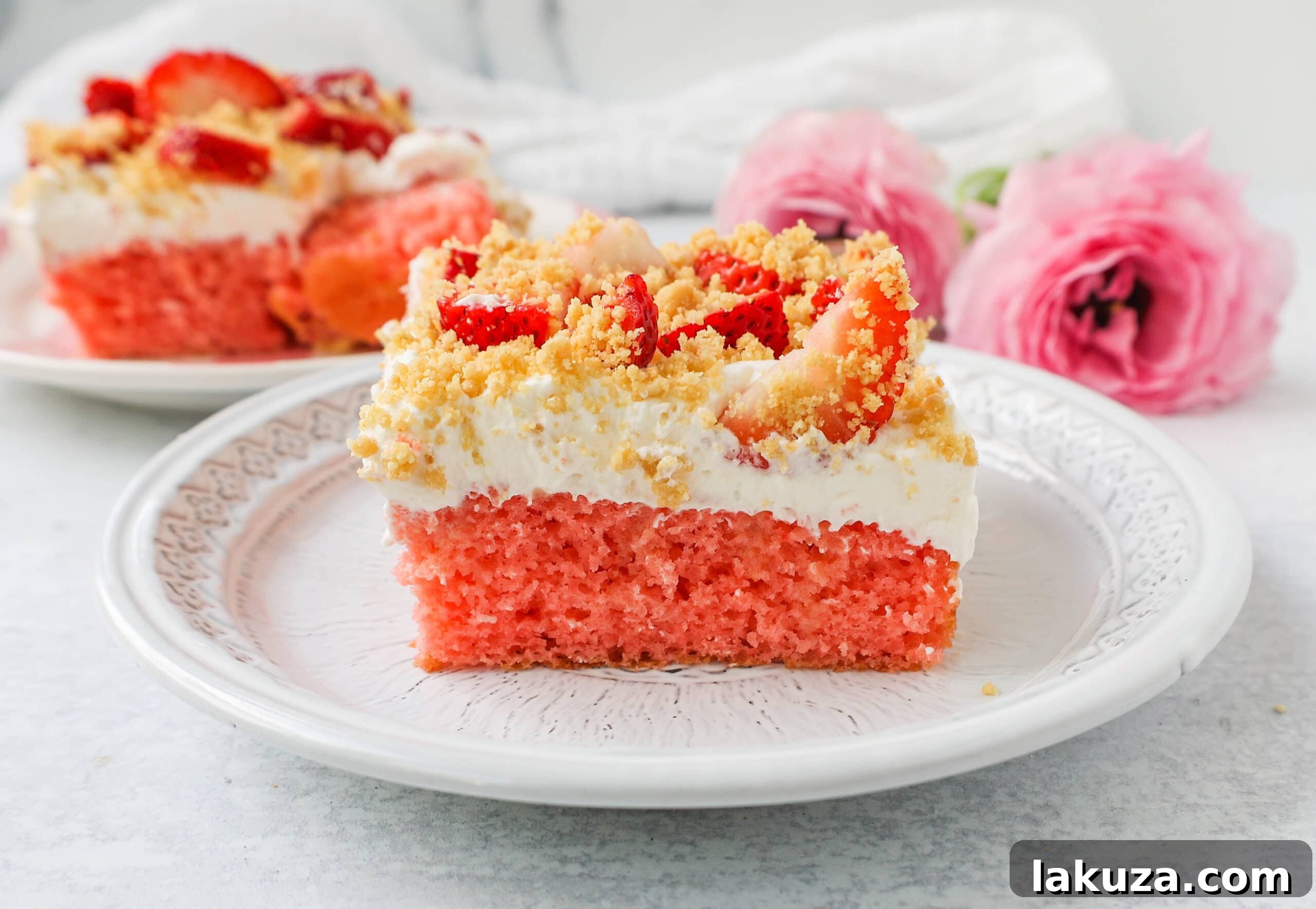 Strawberry Crunch Delight Cake 6 This Strawberry Cream Crunch Cake is a strawberry cake soaked with sweetened condensed milk after baking and topped with fresh sweet whipped cream, fresh strawberries, and crushed golden Oreos for crunch. This strawberry poke cake has it all!