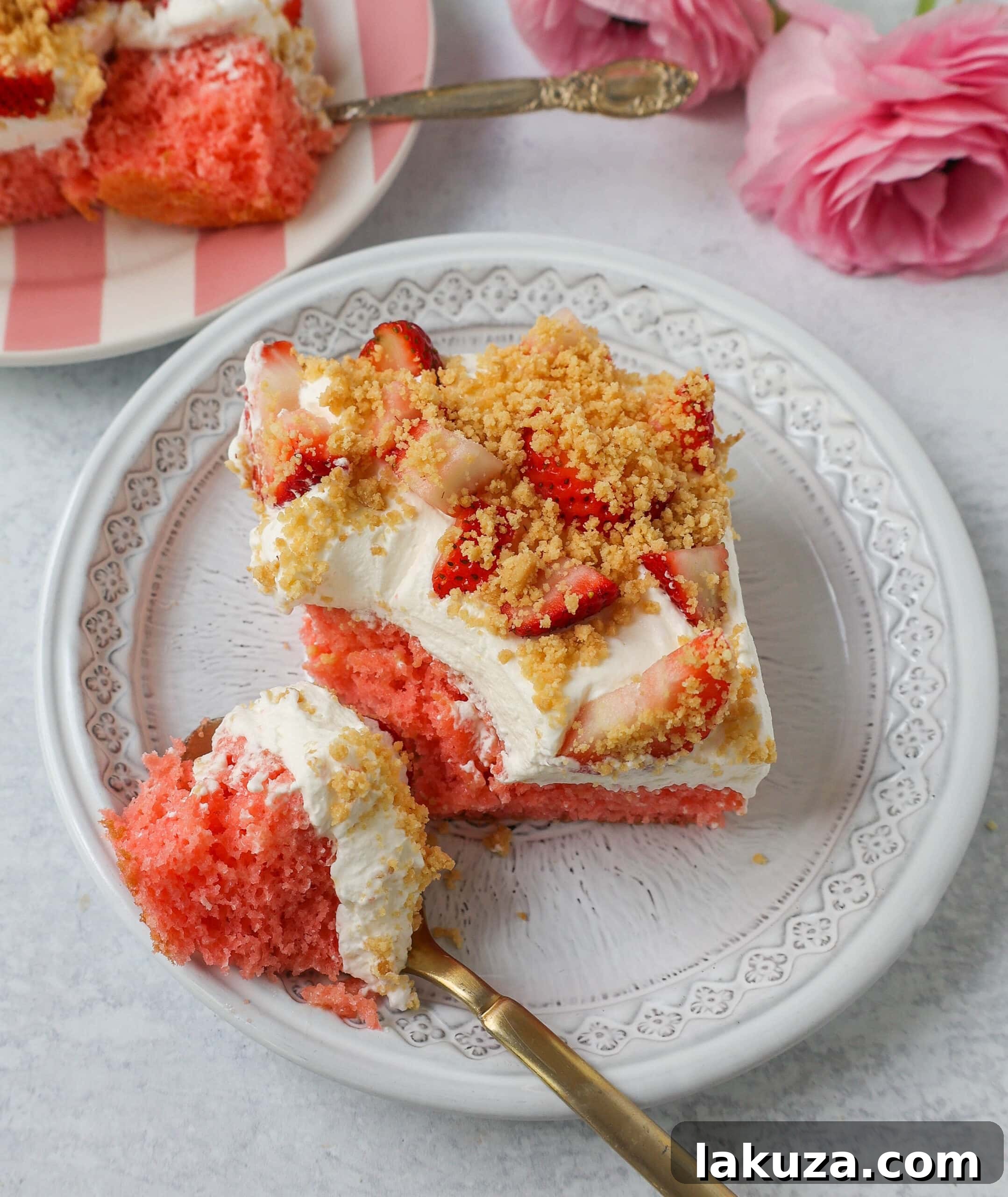 Strawberry Crunch Delight Cake 7 This Strawberry Cream Crunch Cake is a strawberry cake soaked with sweetened condensed milk after baking and topped with fresh sweet whipped cream, fresh strawberries, and crushed golden Oreos for crunch. This strawberry poke cake has it all!