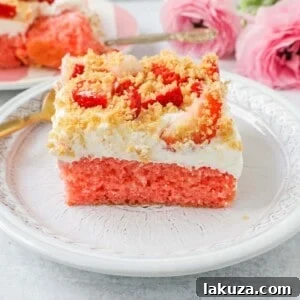 Strawberry Crunch Delight Cake 9 This Strawberry Cream Crunch Cake is a strawberry cake soaked with sweetened condensed milk after baking and topped with fresh sweet whipped cream, fresh strawberries, and crushed golden Oreos for crunch. This strawberry poke cake has it all!