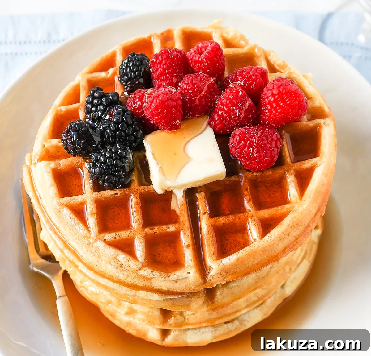 Homemade Belgian Waffles with crispy edges and chewy centers. The best buttermilk waffle recipe for a perfect weekend breakfast.