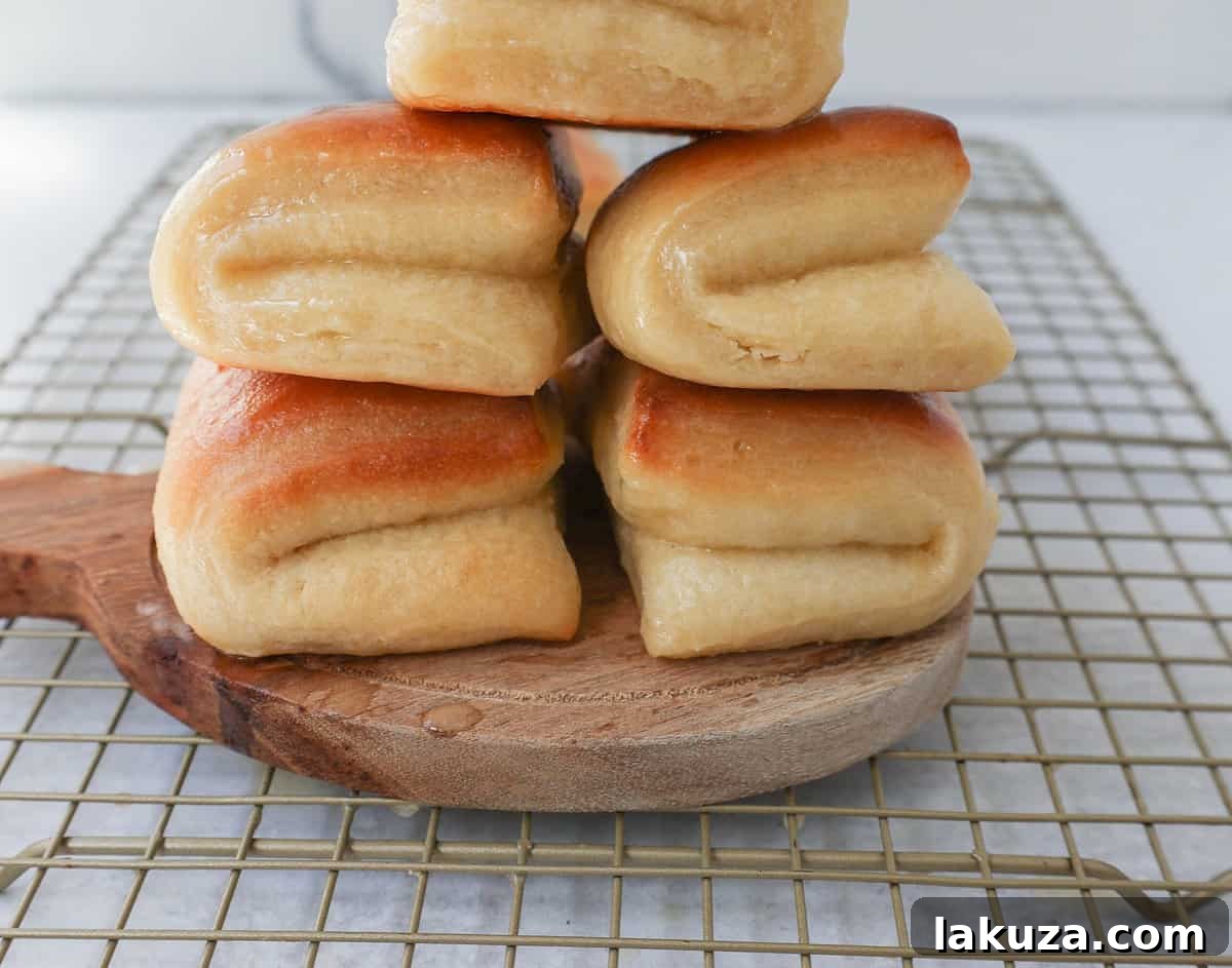 Ultimate Parker House Rolls 11 The Famous Parker House Rolls are light, fluffy, and buttery with a secret ingredient that make them tender and melt in your mouth. This the best parker house roll recipe!