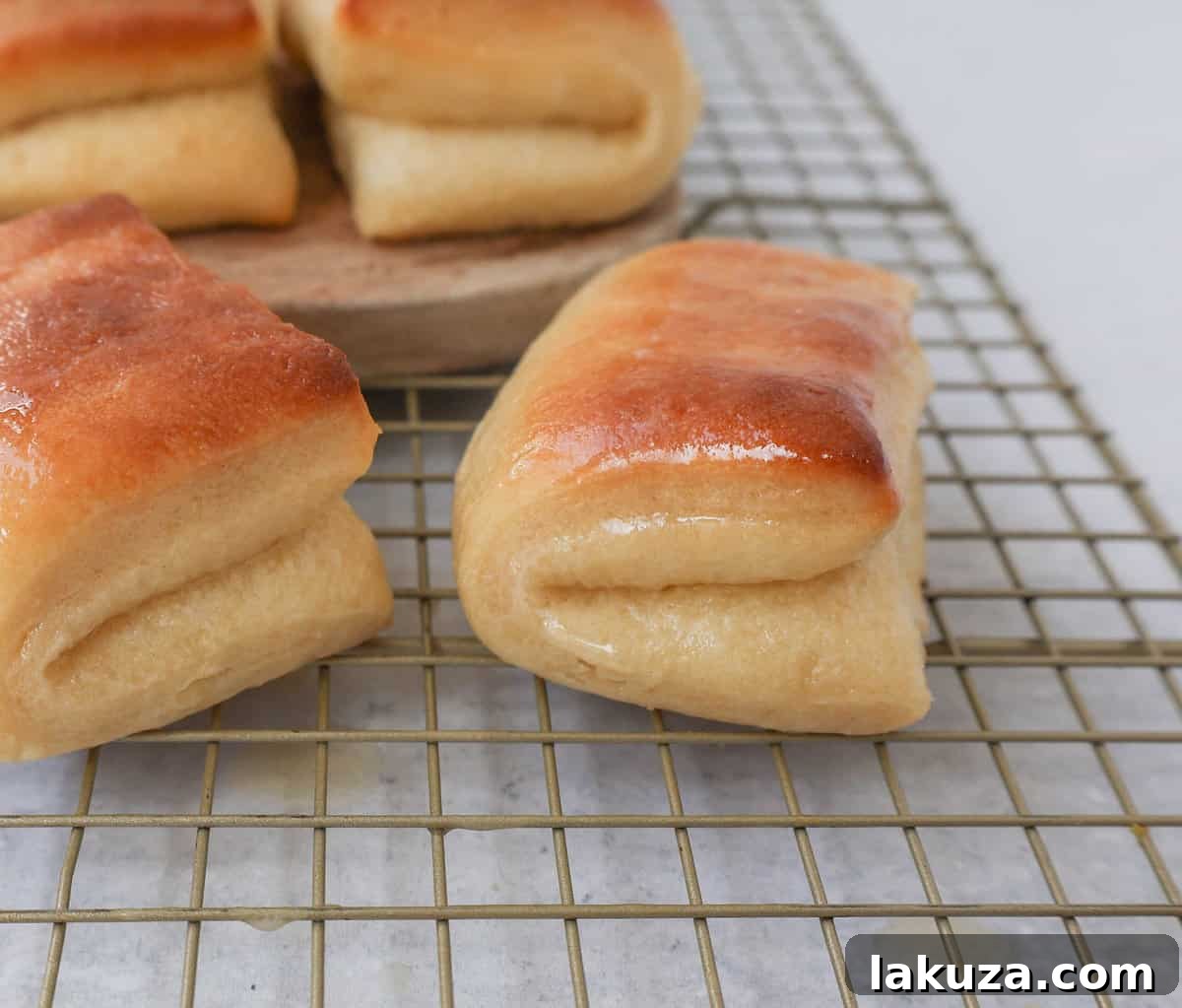 Ultimate Parker House Rolls 13 The Famous Parker House Rolls are light, fluffy, and buttery with a secret ingredient that makes them tender and melt in your mouth. This is the best Parker house roll recipe!