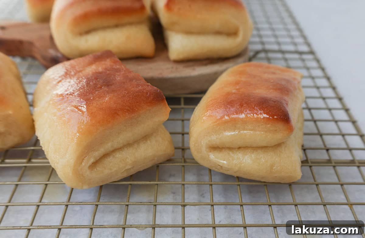 Ultimate Parker House Rolls 5 The Famous Parker House Rolls are light, fluffy, and buttery with a secret ingredient that make them tender and melt in your mouth. This the best parker house roll recipe!