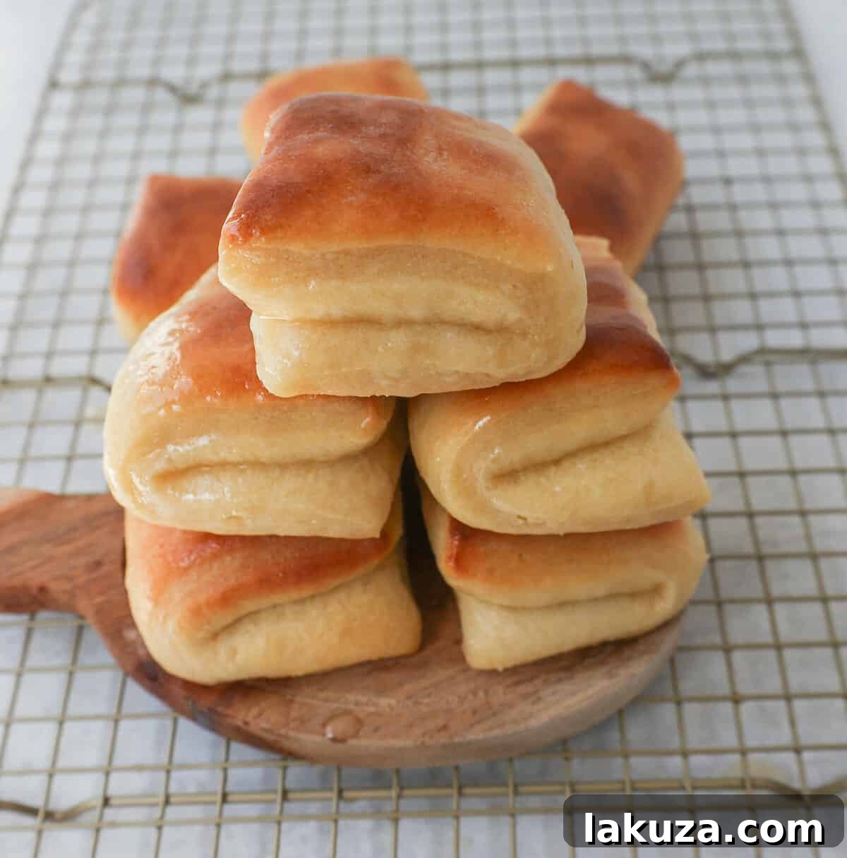 Ultimate Parker House Rolls 6 The Famous Parker House Rolls are light, fluffy, and buttery with a secret ingredient that make them tender and melt in your mouth. This the best parker house roll recipe!