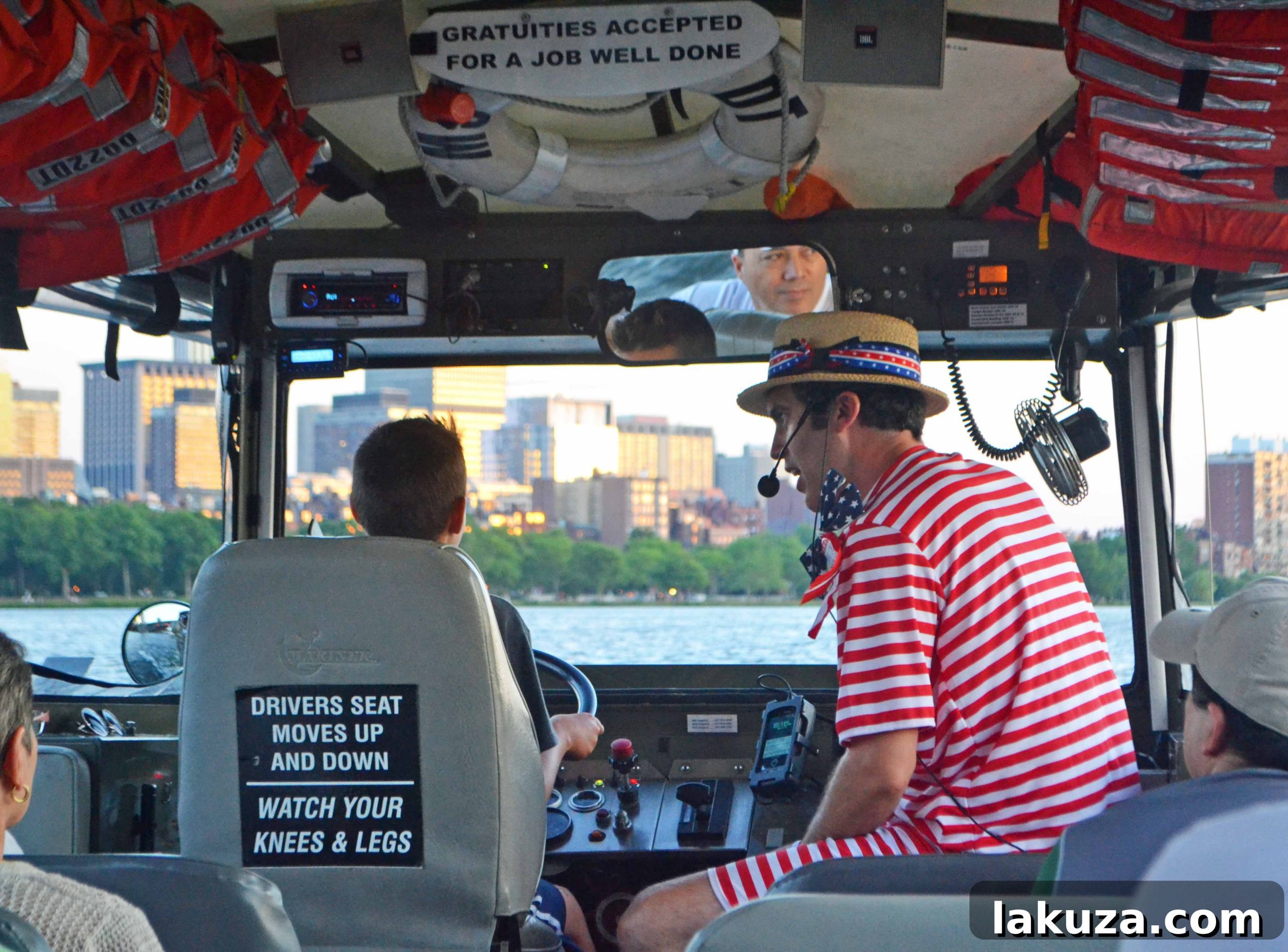 Explore Boston's Flavors and Unforgettable Sights 14 Boston Duck Tour boat on the Charles River with city skyline in background