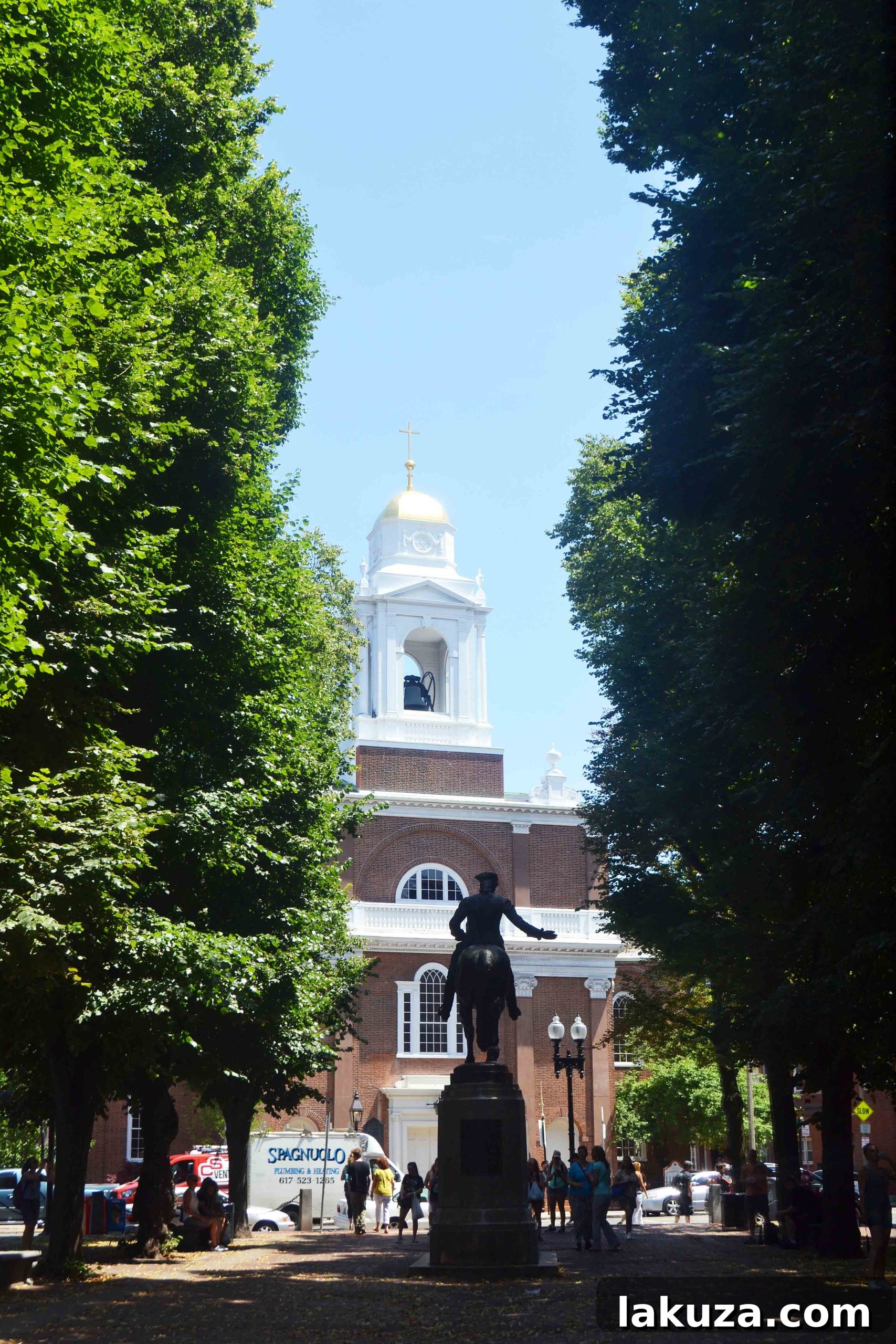 Explore Boston's Flavors and Unforgettable Sights 6 Bustling street with classic Boston architecture and pedestrians