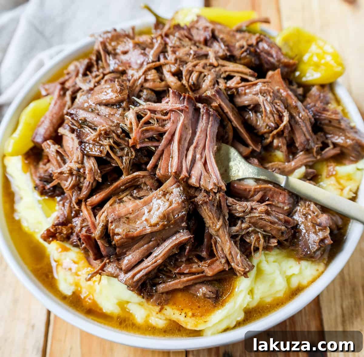 Tender and flavorful Mississippi Pot Roast slow cooked to perfection, ideal for a hearty family meal.