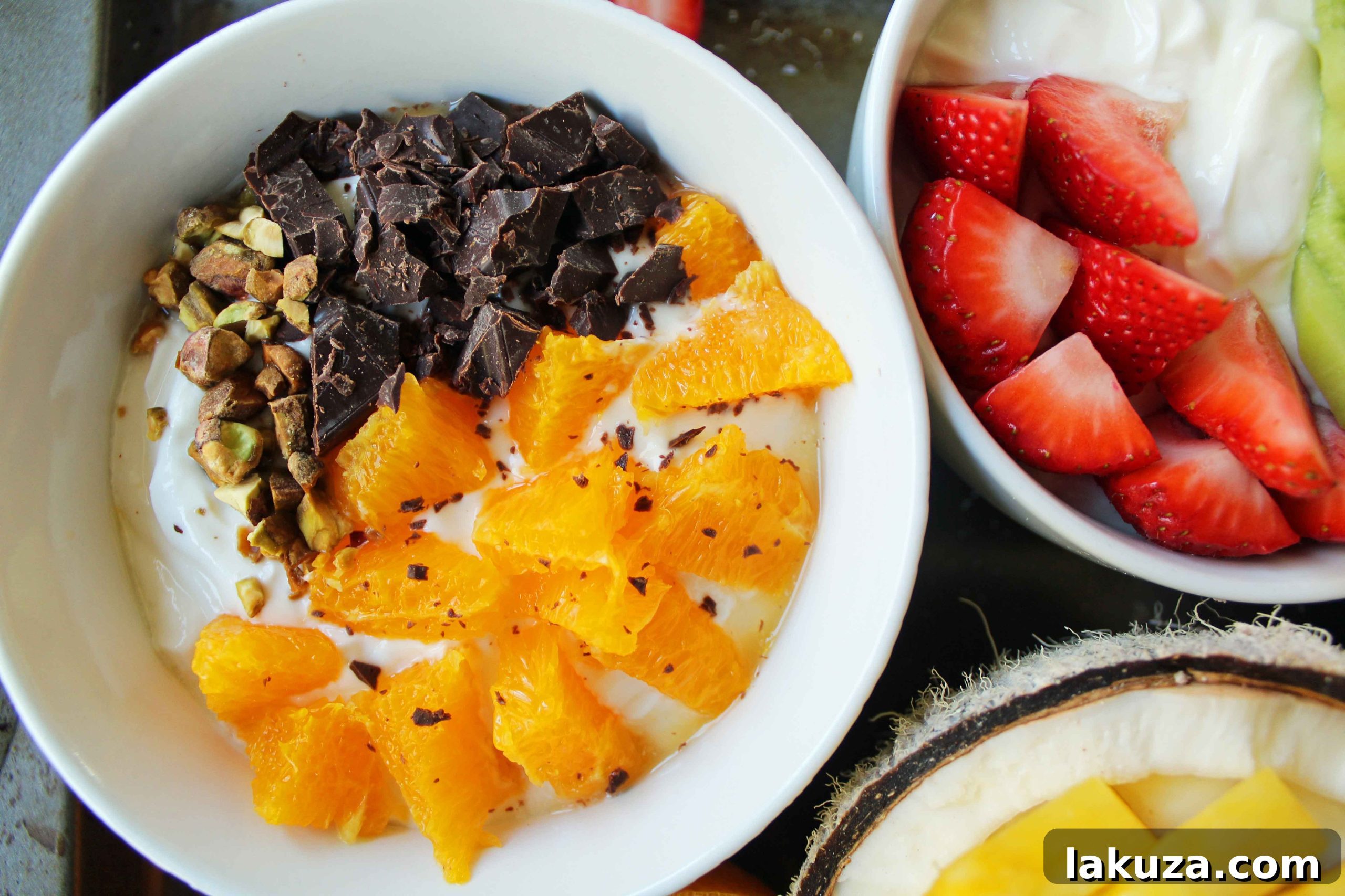 Greek Yogurt Breakfast Bowls with Toppings by Modern Honey. Healthy Greek Yogurt topped with fresh fruits, nuts, and honey. It's a perfect breakfast to start the day!