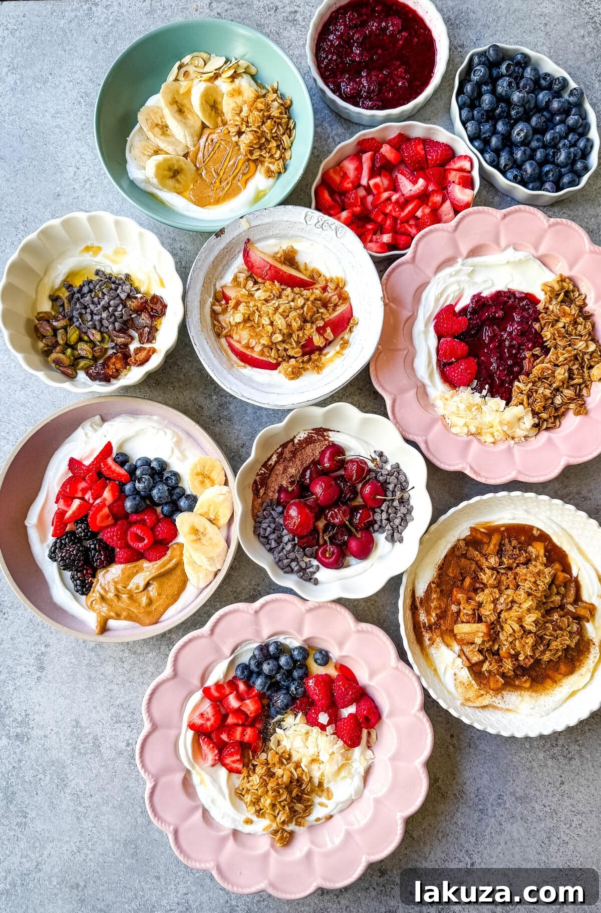 Greek Yogurt Breakfast Bowls start with rich creamy yogurt, topped with fresh fruits, nuts, granola, and superfoods for a perfect start to the day! How to make the best Greek yogurt bowls with toppings. You will find over 20+ Greek Yogurt Bowl combinations with different topping ideas for high protein yogurt bowls, what toppings pair well with greek yogurt, and recipes.