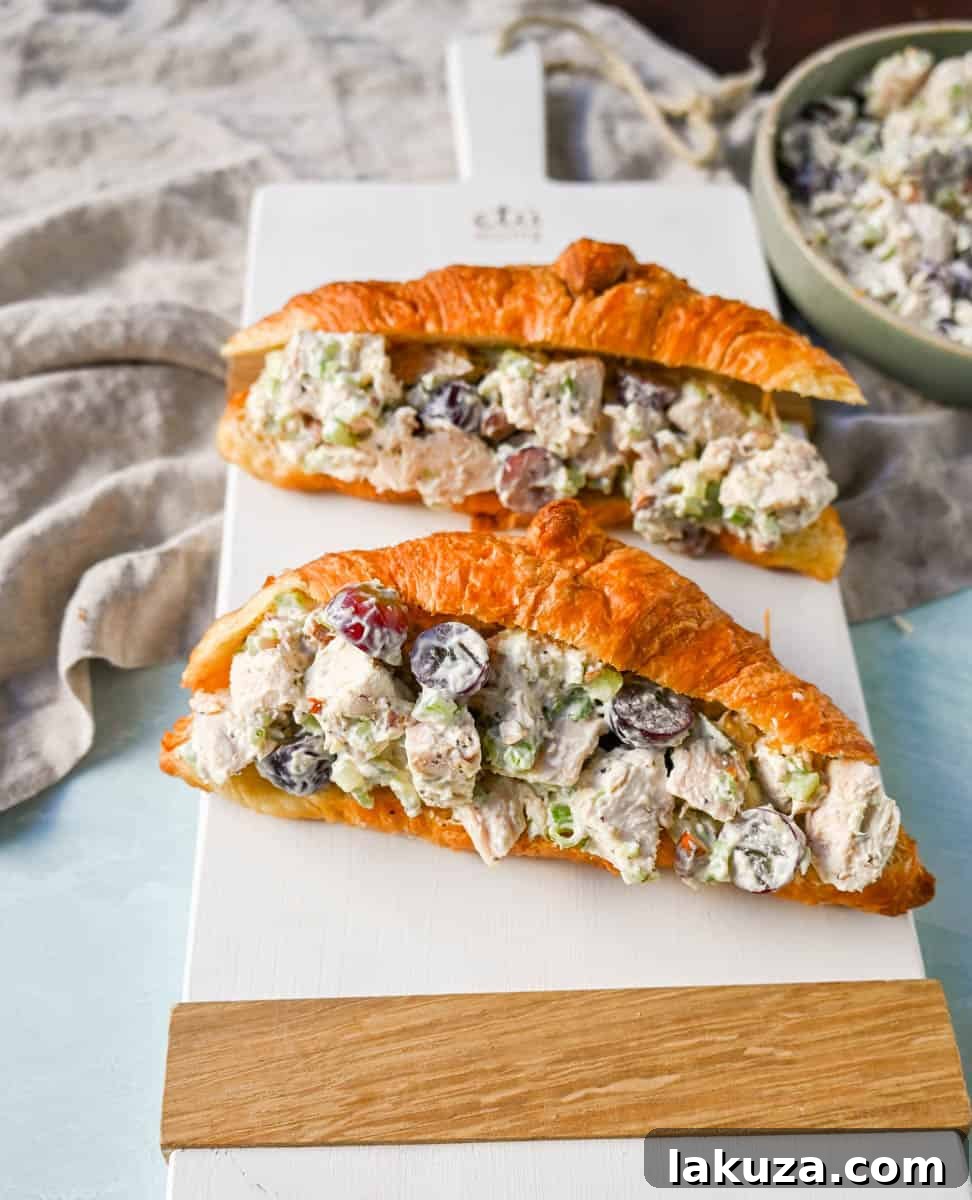 Ultimate Chicken Salad 4 Creamy Homemade Chicken Salad made with tender chicken, crunchy celery, green onion, sweet grapes, and crunchy almonds in a mayonnaise dressing. This is a classic chicken salad recipe that everyone loves and is perfect for a quick lunch or potluck.